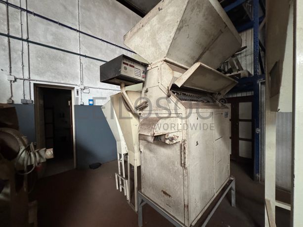 Fotografia de : Máquina de contar rolhas
