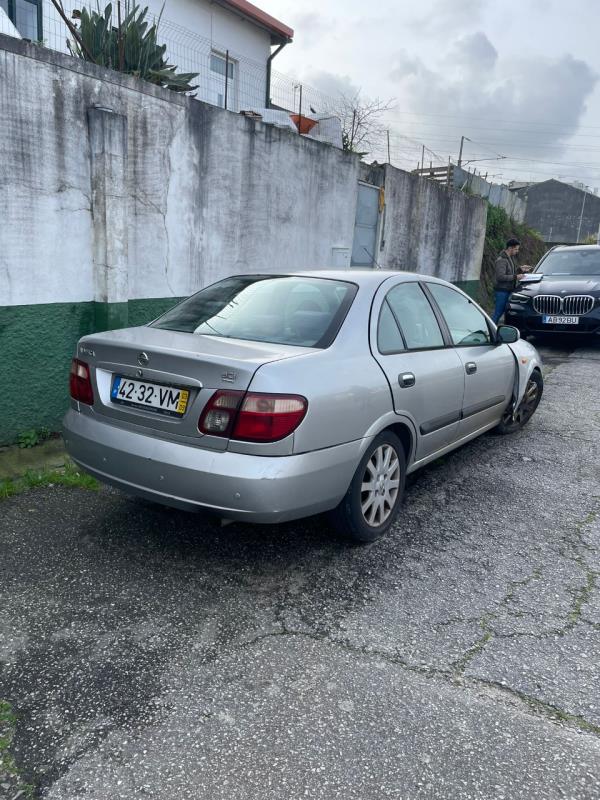 Fotografia de veículo: Veículo  da passageiros da marca NISSAN