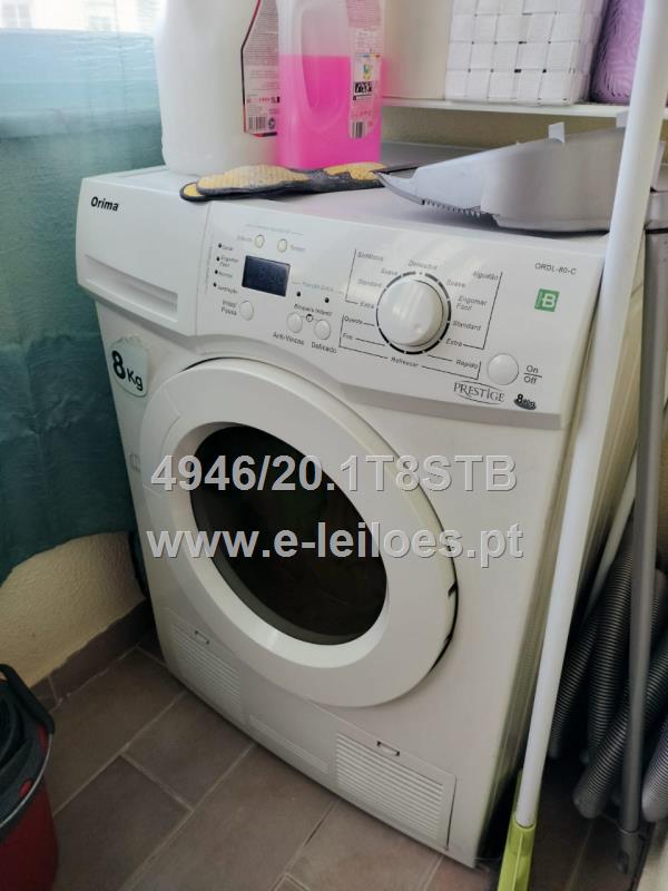 recheio de habitação composto por electrodomésticos e móveis