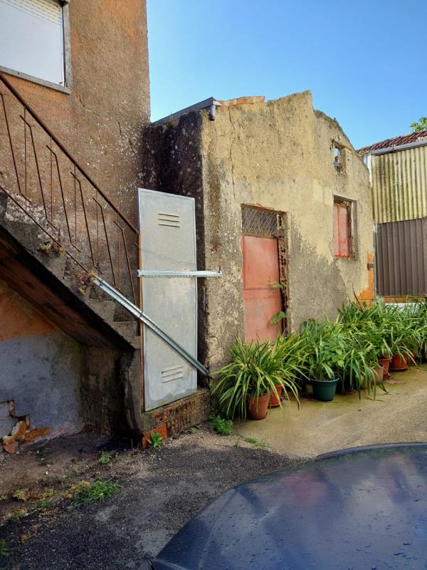Fotografia de imóvel: 1/3 de uma moradia destinada a habitação