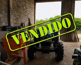 Fotografia 1 de 8: Trator agrícola, marca New Holland, com data de matrícula 19